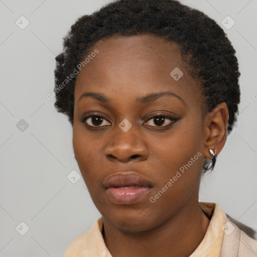 Neutral black young-adult female with short  brown hair and brown eyes