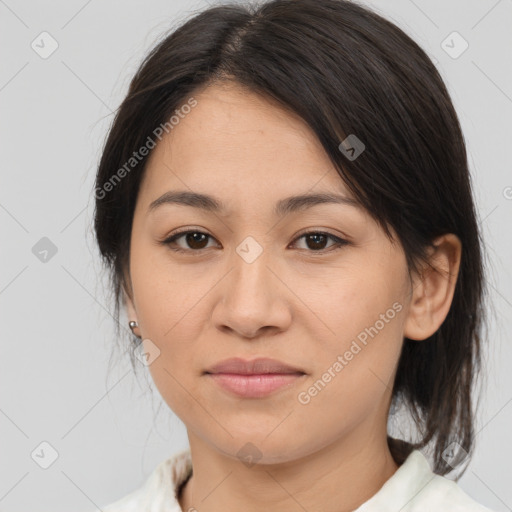 Joyful asian young-adult female with medium  brown hair and brown eyes