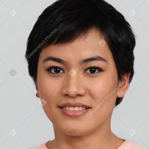 Joyful asian young-adult female with short  black hair and brown eyes