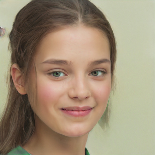 Joyful white child female with medium  brown hair and green eyes