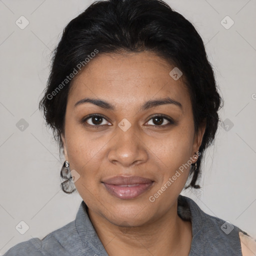 Joyful black adult female with short  brown hair and brown eyes