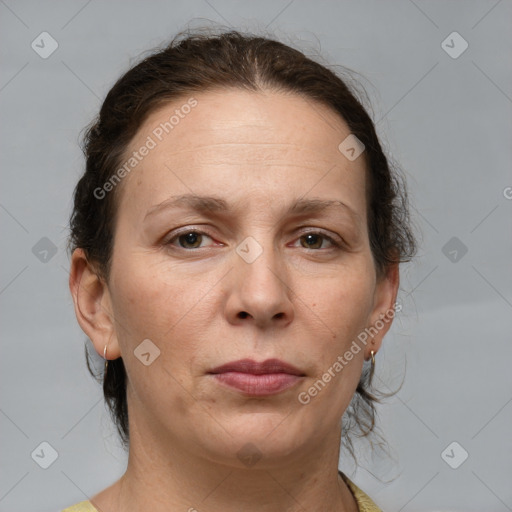 Neutral white adult female with medium  brown hair and grey eyes