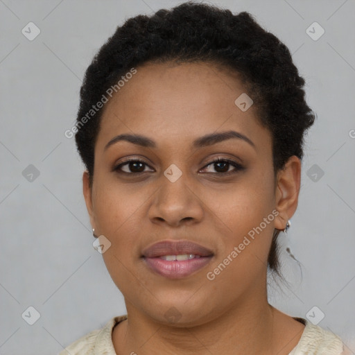 Joyful black young-adult female with short  brown hair and brown eyes