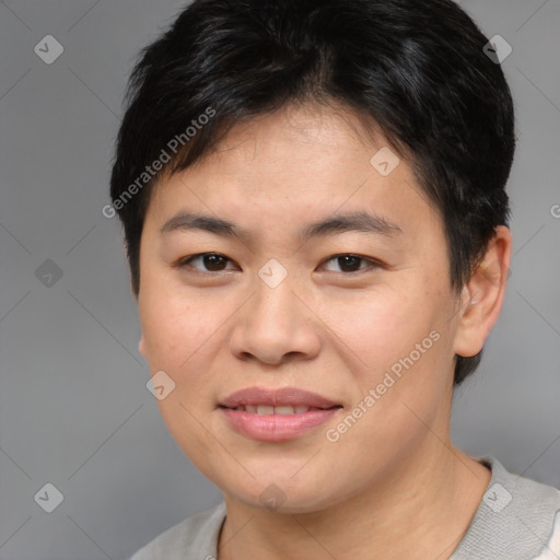 Joyful asian young-adult female with short  brown hair and brown eyes