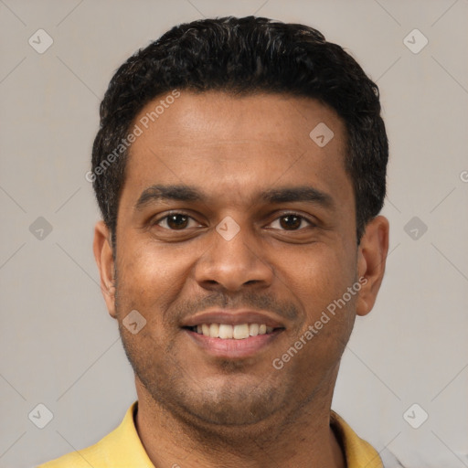Joyful latino young-adult male with short  black hair and brown eyes