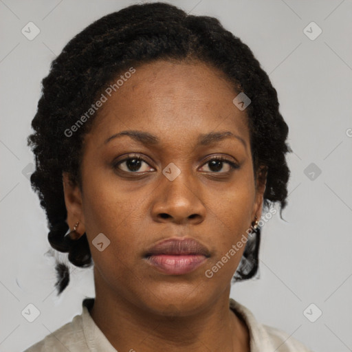 Neutral black young-adult female with short  brown hair and brown eyes