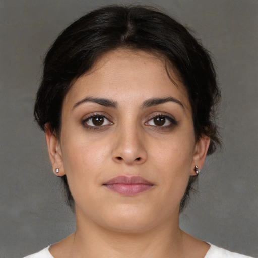 Neutral white young-adult female with short  brown hair and brown eyes