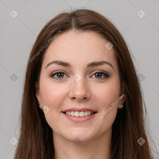 Joyful white young-adult female with long  brown hair and grey eyes