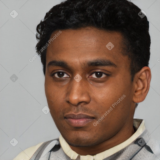 Neutral black young-adult male with short  black hair and brown eyes