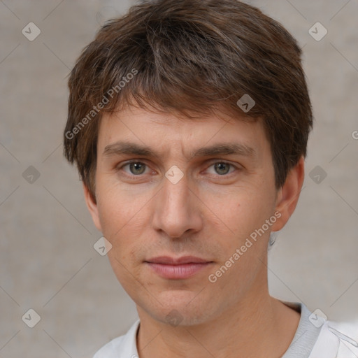 Neutral white young-adult male with short  brown hair and brown eyes