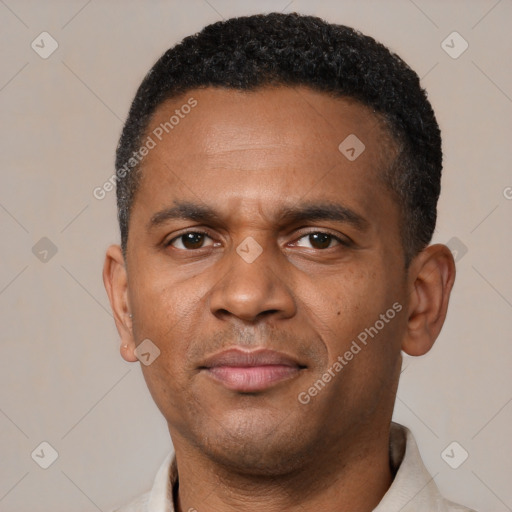 Neutral black young-adult male with short  black hair and brown eyes