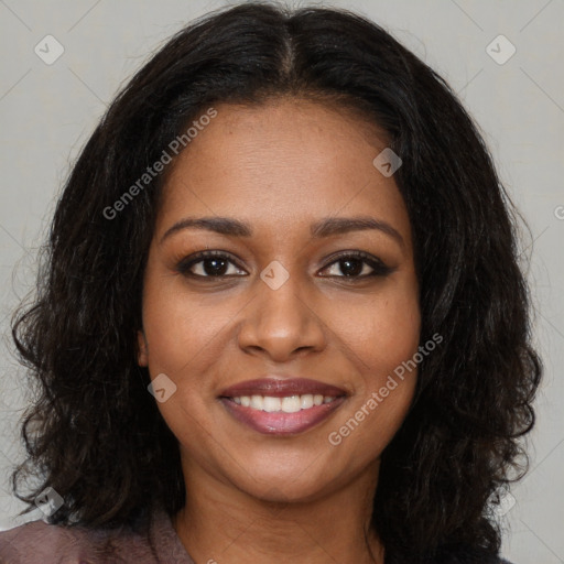Joyful black young-adult female with long  brown hair and brown eyes