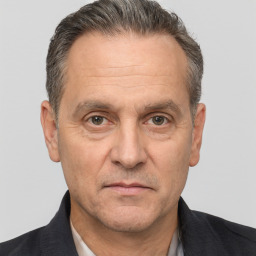 Neutral white middle-aged male with short  brown hair and brown eyes