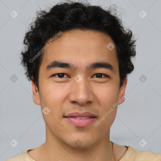 Joyful latino young-adult male with short  brown hair and brown eyes