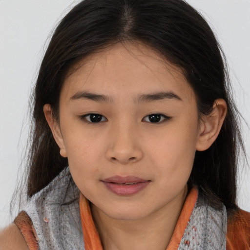 Joyful asian child female with medium  brown hair and brown eyes