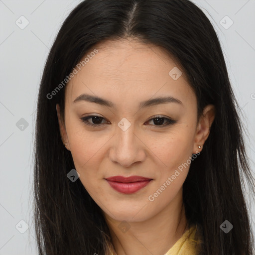 Joyful asian young-adult female with long  brown hair and brown eyes