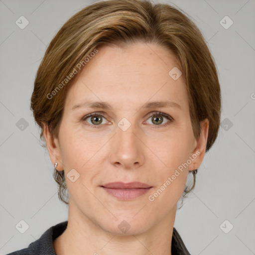 Joyful white adult female with medium  brown hair and grey eyes