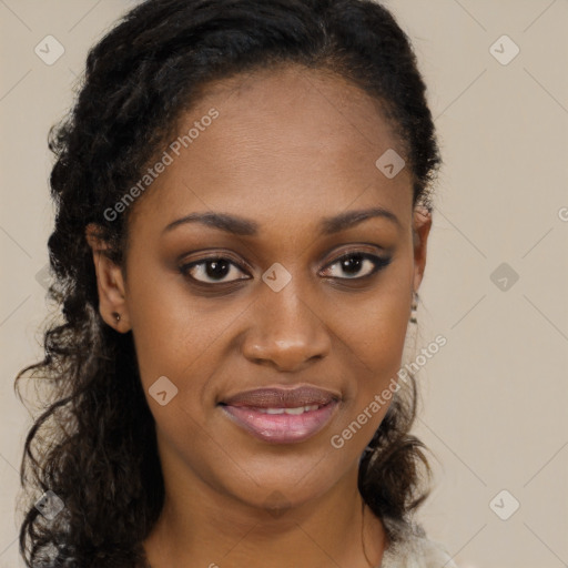 Joyful black young-adult female with long  brown hair and brown eyes