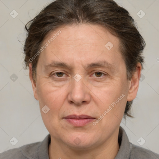 Joyful white adult male with medium  brown hair and brown eyes