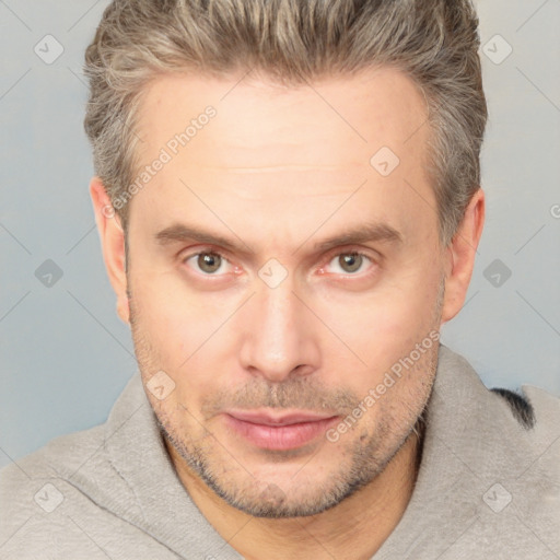 Neutral white adult male with short  brown hair and brown eyes