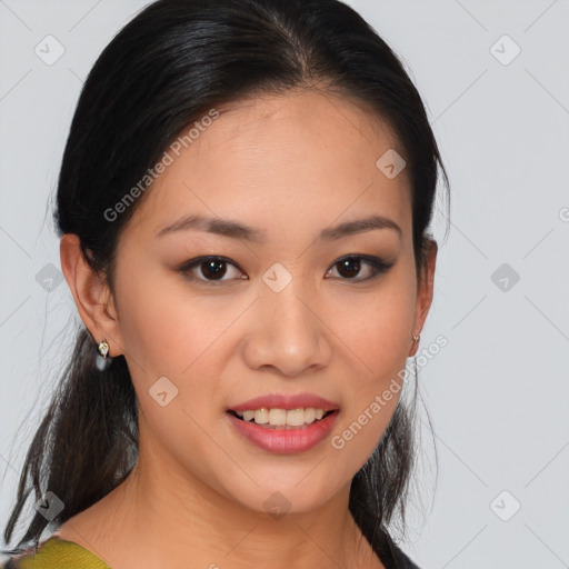 Joyful asian young-adult female with medium  brown hair and brown eyes