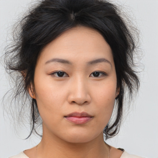 Neutral asian young-adult female with medium  black hair and brown eyes