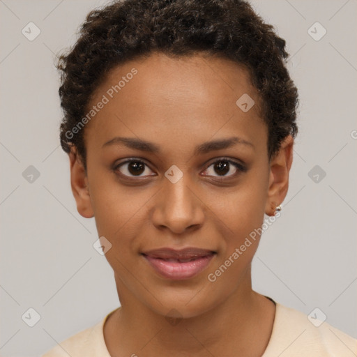 Joyful black young-adult female with short  brown hair and brown eyes