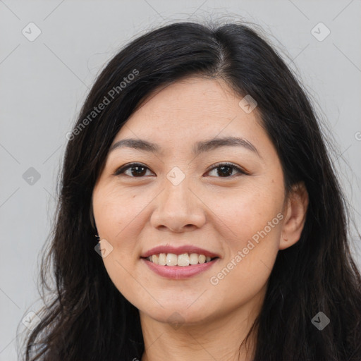 Joyful white young-adult female with long  brown hair and brown eyes