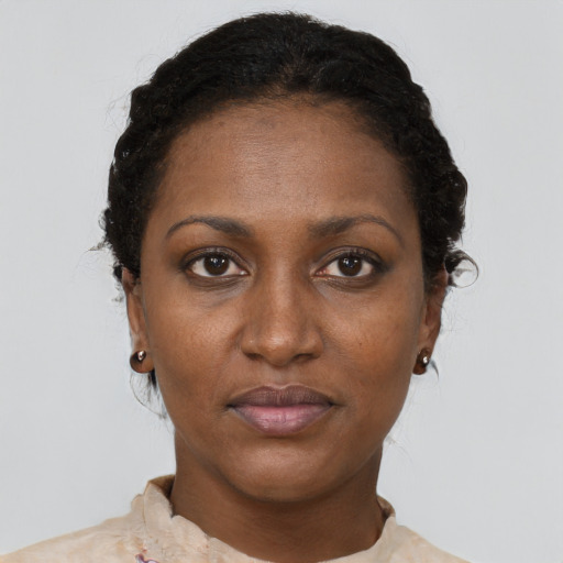 Neutral black adult female with short  brown hair and brown eyes