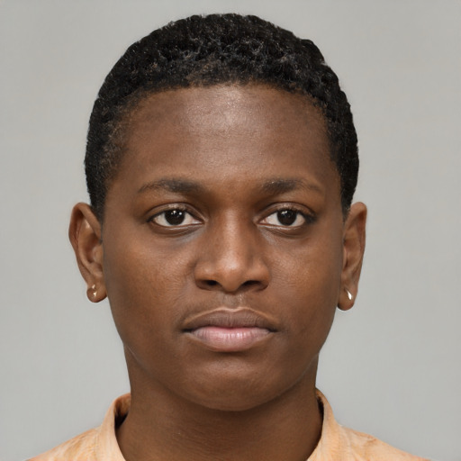 Neutral black young-adult female with short  brown hair and brown eyes