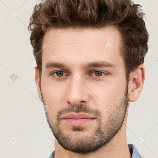 Neutral white young-adult male with short  brown hair and grey eyes