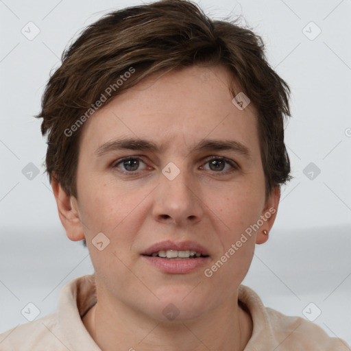 Joyful white young-adult female with short  brown hair and grey eyes