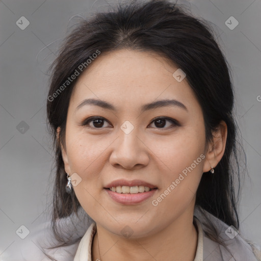 Joyful latino young-adult female with medium  brown hair and brown eyes