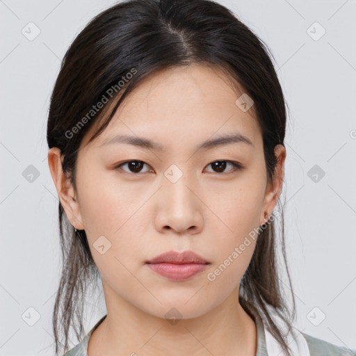 Neutral asian young-adult female with medium  brown hair and brown eyes