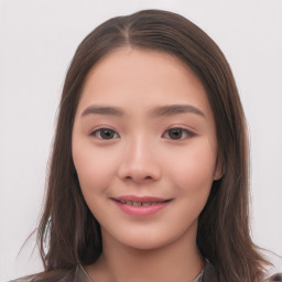 Joyful white child female with long  brown hair and brown eyes