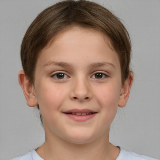 Joyful white child female with short  brown hair and brown eyes