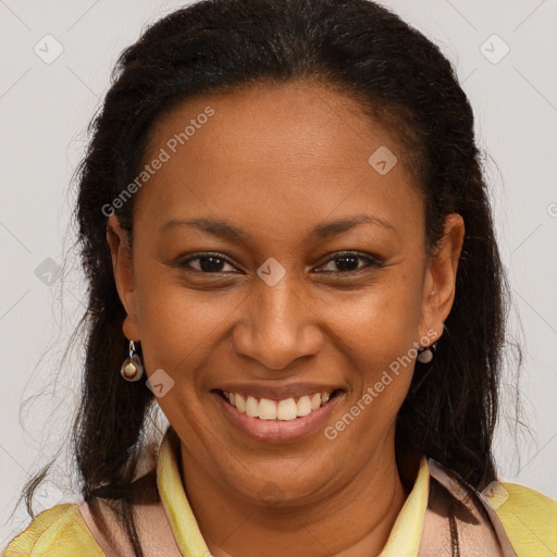 Joyful latino young-adult female with long  brown hair and brown eyes