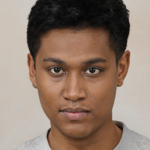 Neutral latino young-adult male with short  brown hair and brown eyes
