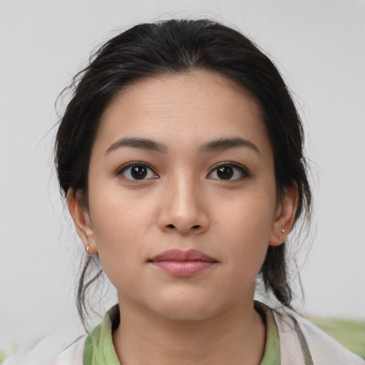 Neutral asian young-adult female with medium  brown hair and brown eyes