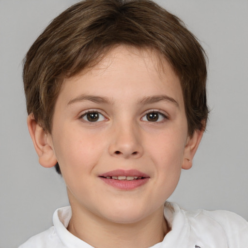 Joyful white child female with short  brown hair and brown eyes