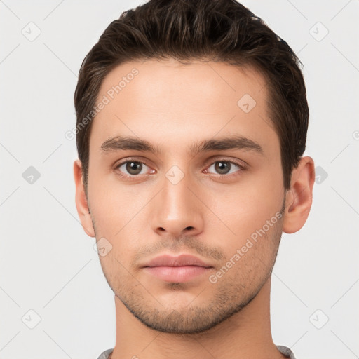 Neutral white young-adult male with short  brown hair and brown eyes