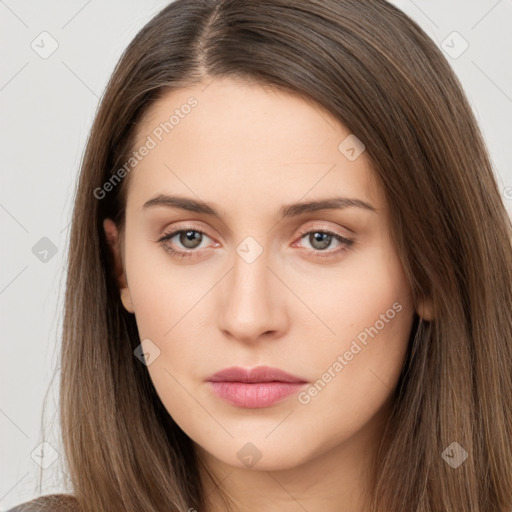 Neutral white young-adult female with long  brown hair and brown eyes