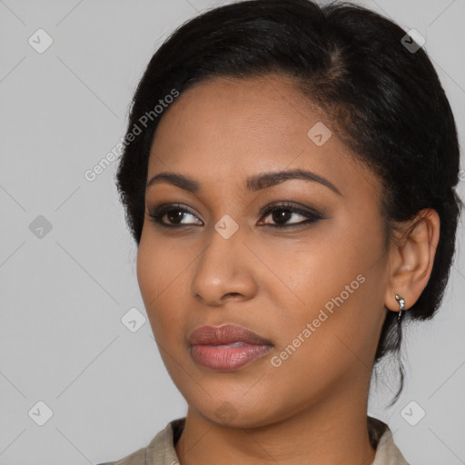 Neutral black young-adult female with medium  black hair and brown eyes