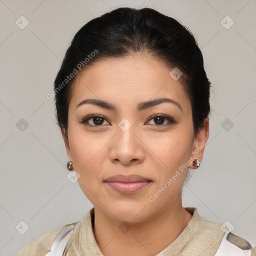 Joyful latino young-adult female with medium  brown hair and brown eyes