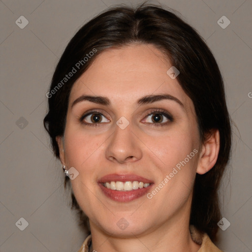 Joyful white young-adult female with long  brown hair and brown eyes