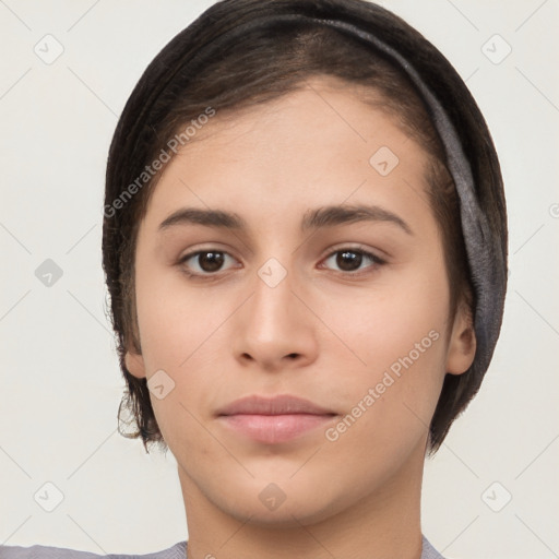 Neutral white young-adult female with short  brown hair and brown eyes