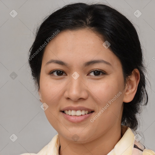 Joyful white young-adult female with medium  brown hair and brown eyes