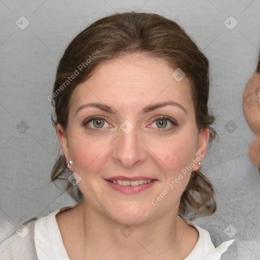 Joyful white young-adult female with medium  brown hair and blue eyes