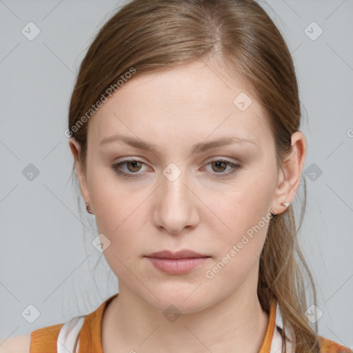 Neutral white young-adult female with long  brown hair and brown eyes