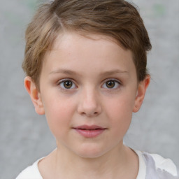 Joyful white child female with short  brown hair and brown eyes